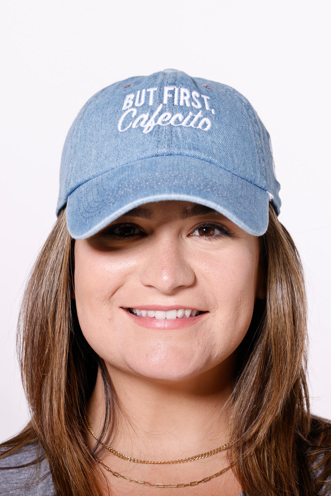 Martha of Miami Wearing But First Cafecito denim hat