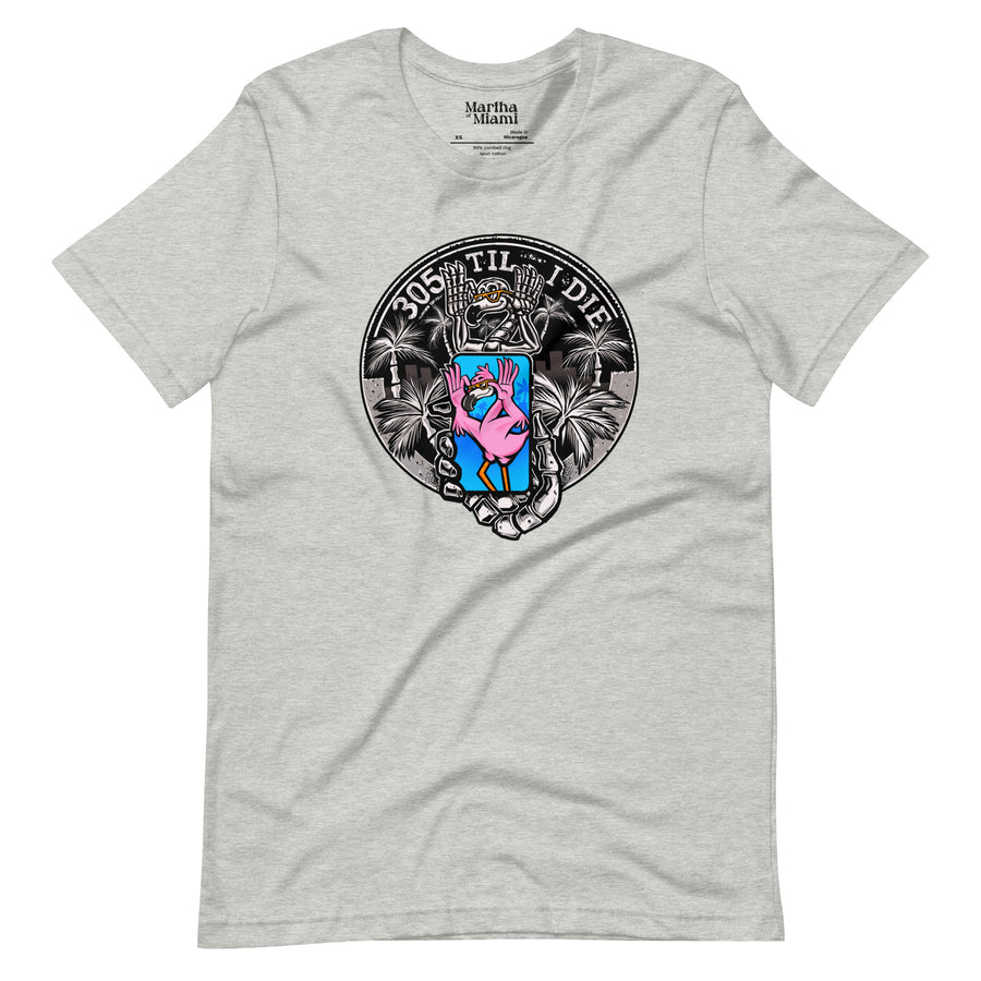 Grey unisex t-shirt with '305 Til I Die' graphic, featuring a vibrant blue and pink heart with a crown, framed by white palm trees and a circular banner, representing Miami pride and culture. 305 Til I Die Miami T-shirt with palm tree design