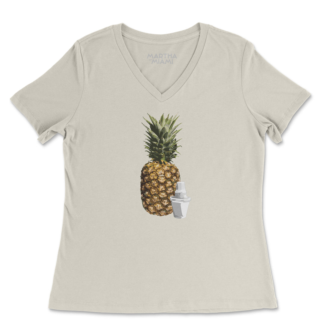 Beige t-shirt with a pineapple graphic on a white background