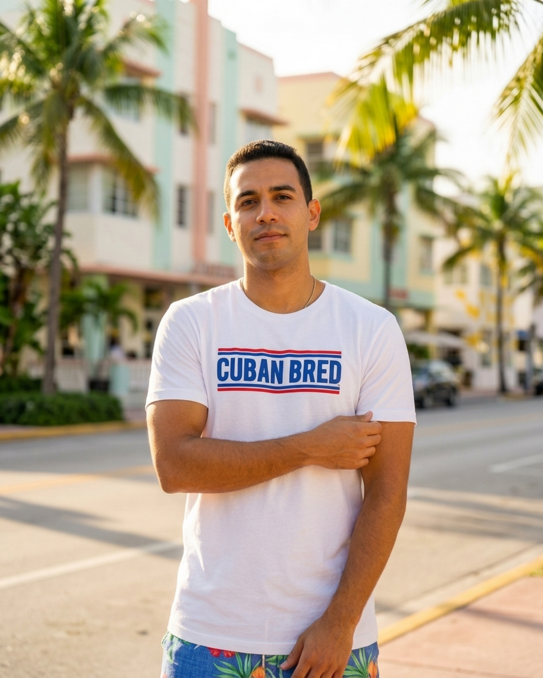 Cuban Bred™ t-shirt styled with Miami Beach swim shorts, male model – Cuban American graphic tee, Miami gift by Martha of Miami