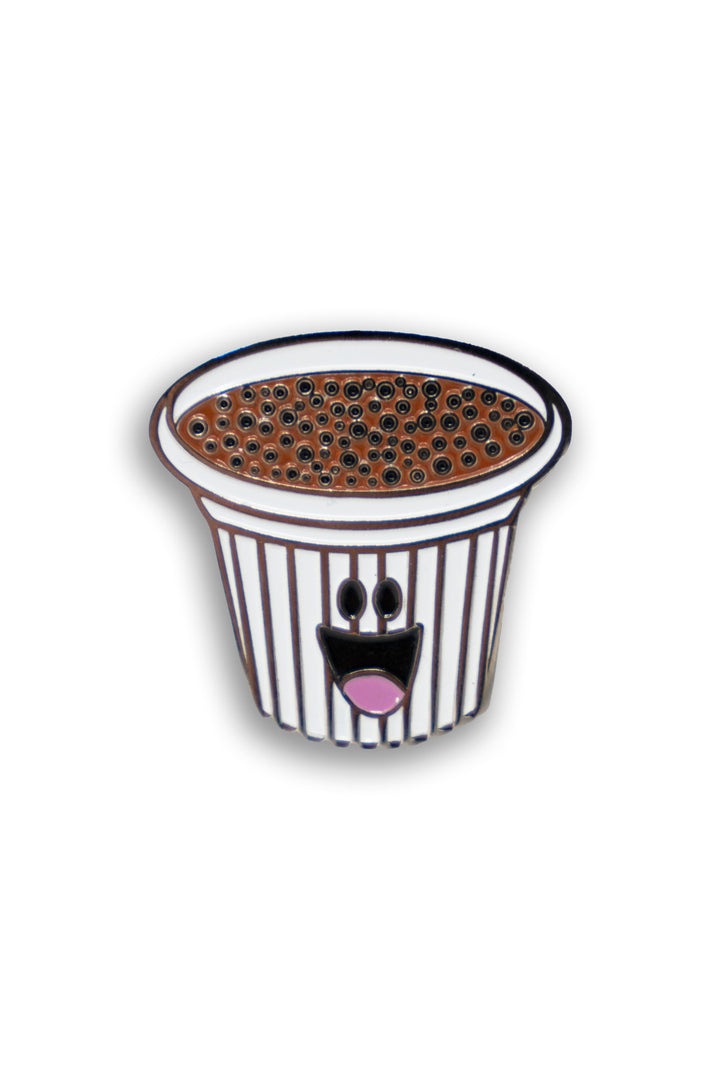an image of a coffee shot pin with a smiley face