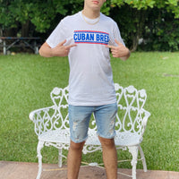 an image of a man wearing the Cuban Bred T-Shirt, a popular cuban shirt
