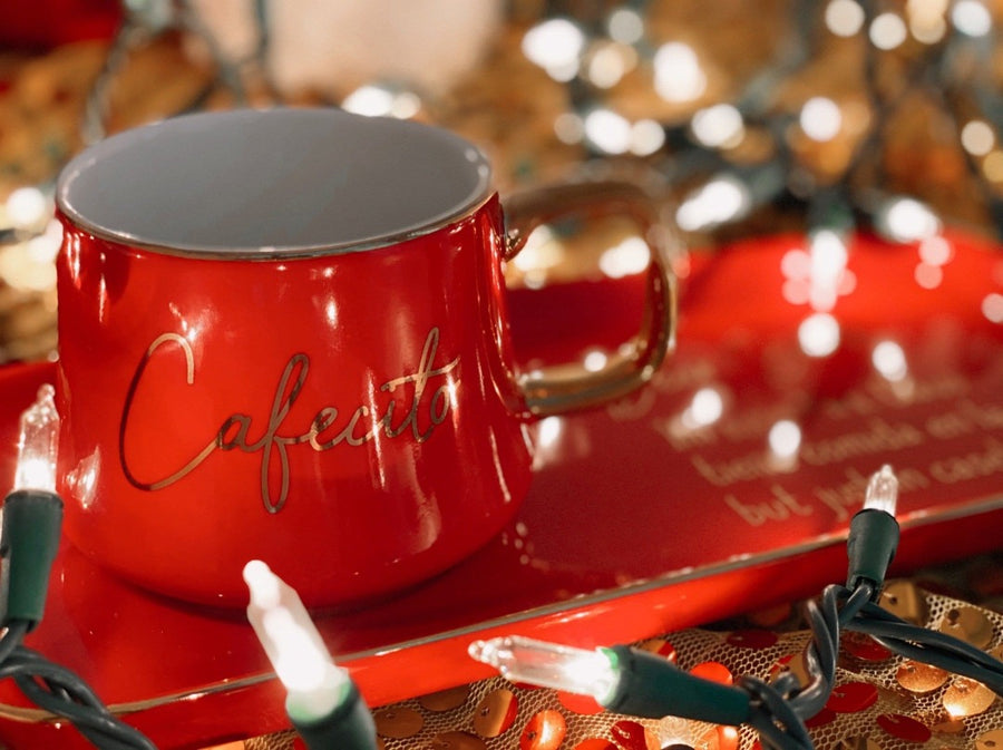 an image of a red coffee mug that says cafecito