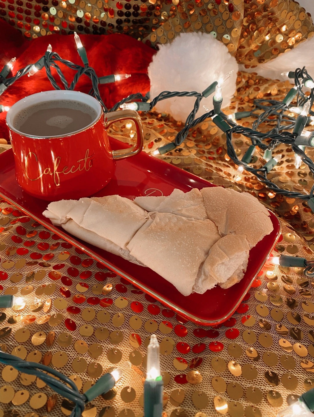 an image of a red coffee mug and cuban bread on top of a red dish plate that says dear santa, I&